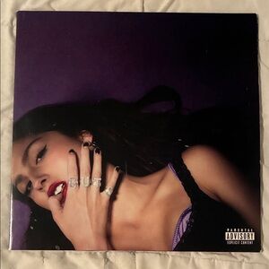 Olivia Rodrigo GUTS record in red